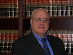 MARK L. WEISENREDER